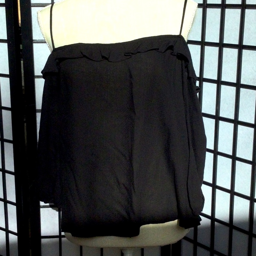 Over the shoulder with straps.